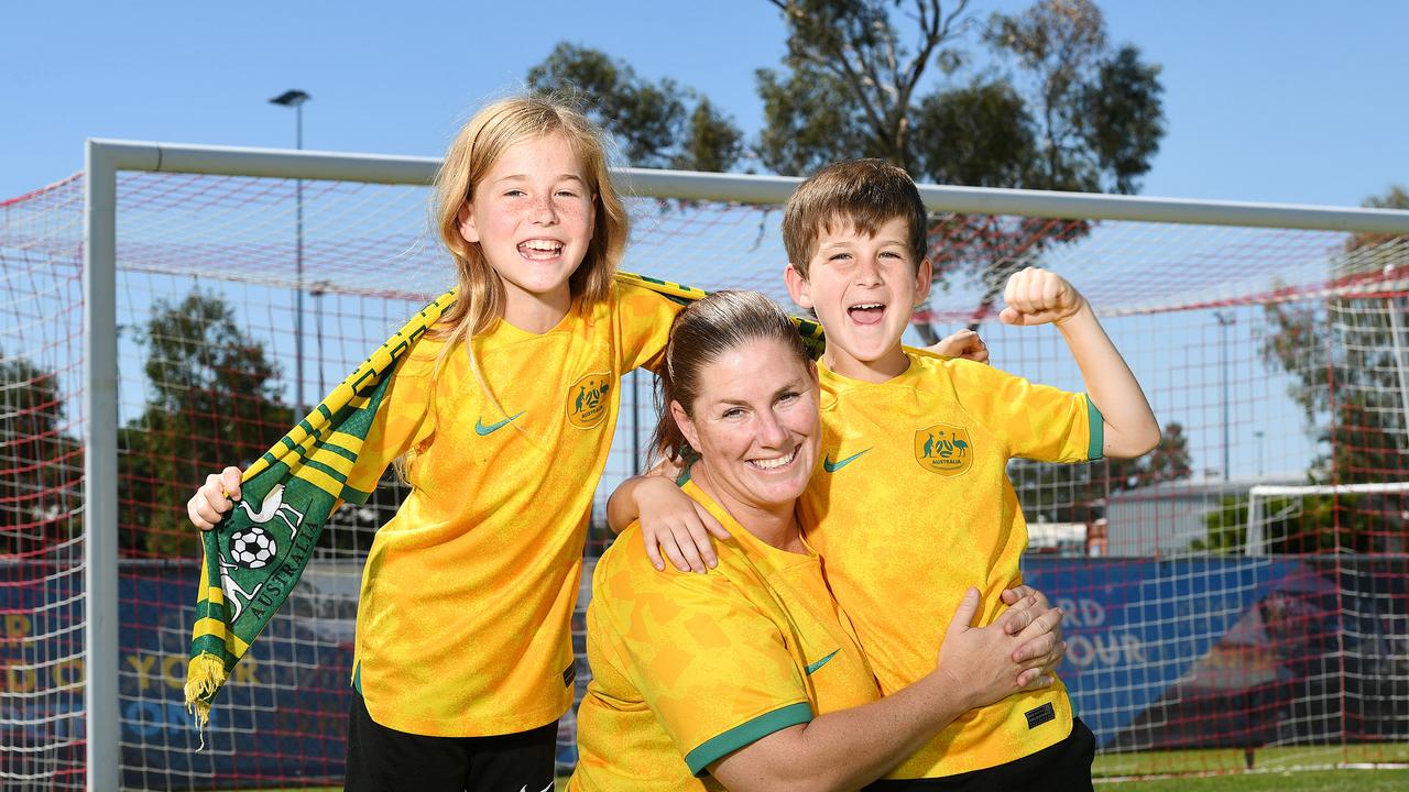 Matildas supporters Lisa Goding with her children Isobella, 11, and Michael, 10, ahead of the FIFA Woman's World Cup semi-final. Picture: Shae Beplate.