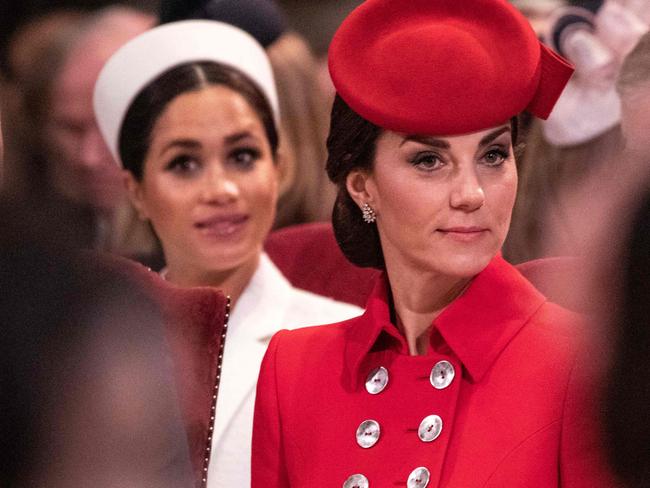 Britain's Meghan, Duchess of Sussex (L) and Britain's Catherine, Duchess of Cambridge, (R) attend the Commonwealth Day service at Westminster Abbey in London on March 11, 2019. - Britain's Queen Elizabeth II has been the Head of the Commonwealth throughout her reign. Organised by the Royal Commonwealth Society, the Service is the largest annual inter-faith gathering in the United Kingdom. (Photo by Richard Pohle / POOL / AFP)