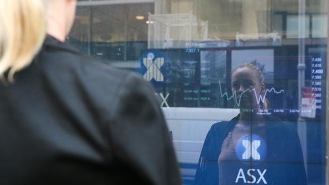 SYDNEY, AUSTRALIA - NewsWire Photos -MARCH 15 2022:  A general view of the latest market movements at the Australian Stock Exchange in Sydney as the impact of Russia's invasion of Ukraine is felt across the world economy. Picture NCA Newswire/ Gaye Gerard