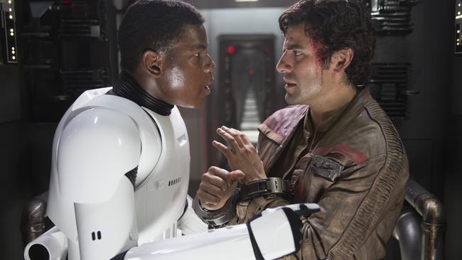 John Boyega and Oscar Isaac in Star Wars: The Force Awakens.