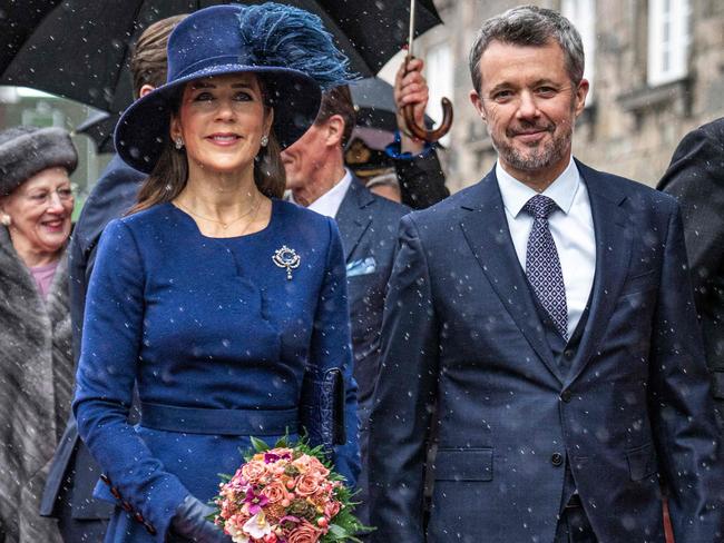 King Frederik X of Denmark (R) and Queen Mary of Denmark (C), followed by Margrethe II of Denmark arrive to attend a session of the Folketing, the Danish parliament, at the Folketingsalen at Christiansborg Palace in Copenhagen, Denmark, on January 15, 2024. It is the first time the royal family visits the Folketing after taking their new official roles. (Photo by Thomas Traasdahl / Ritzau Scanpix / AFP) / Denmark OUT