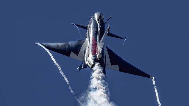 A J-10 fighter jet of the Bayi Aerobatics Team of the People's Liberation Army Air Force (PLAAF) performs in the sky ahead of Changchun Air Show. Picture: Getty Images.