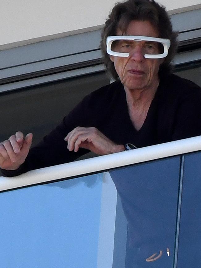 Rolling Stones frontman Mick Jagger in Miami wearing Adelaide designed and manufactured light therapy Re-Timer glasses. Picture: Mega Agency