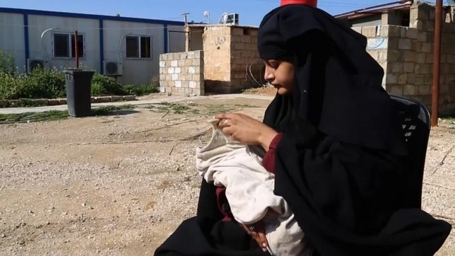 Shamima Begum with her baby boy in the al-Hawl refugee camp in Syria. 