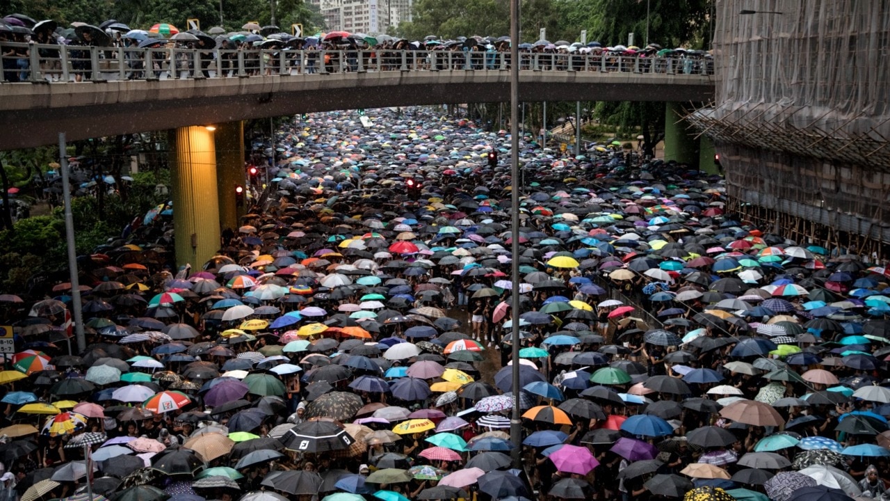 Protestors flood Hong Kong despite rain | news.com.au — Australia’s ...