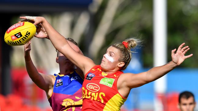 Jordann Hickey (right) of the Suns in action during the Round 3 AFLW match between the Gold Coast Suns and Brisbane Lions at Metricon Stadium on the Gold Coast, Saturday, February 22, 2020 (AAP Image/Darren England)