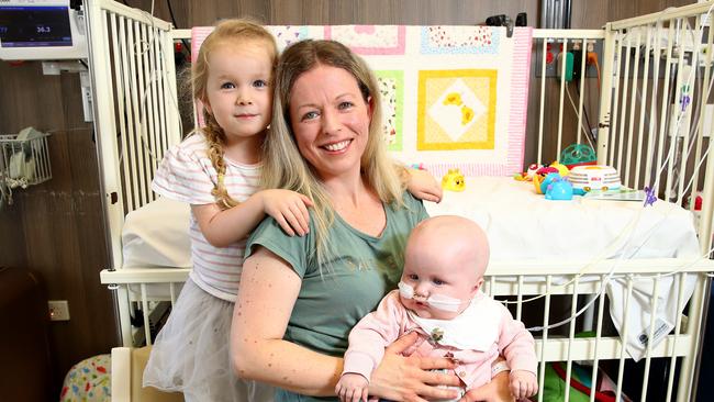 Mum of the Year Christie Rea at John Hunter Children's Hospital with daughters Catya and Imogen. Picture: Toby Zerna