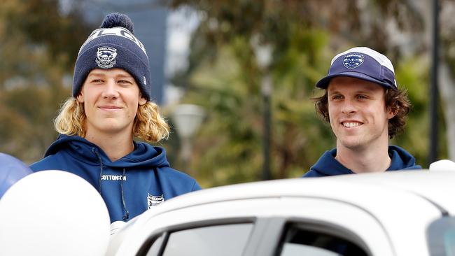 Sam De Koning and Max Holmes take part in the grand final parade. Picture: Dylan Burns/AFL Photos via Getty Images