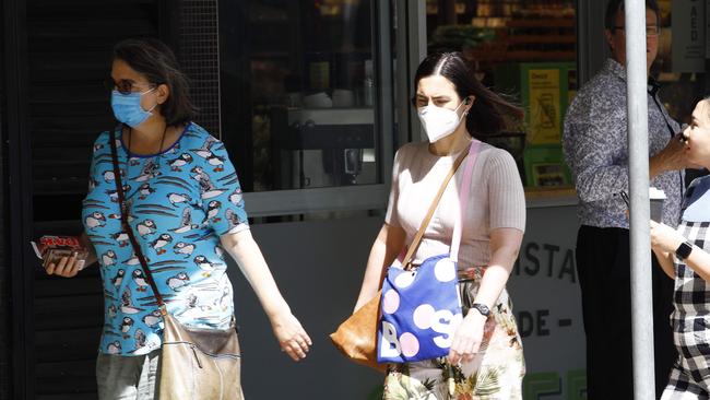 Some Queenslanders are wearing masks again as cases begin to rise. Picture: NCA NewsWire/Tertius Pickard