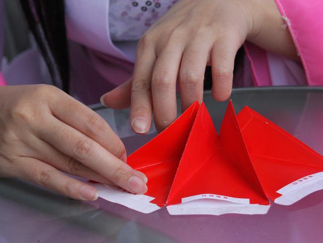 News Queensland BSM lanterns from traditional red envelopes. Minnie Sheng and Jenny Chen.