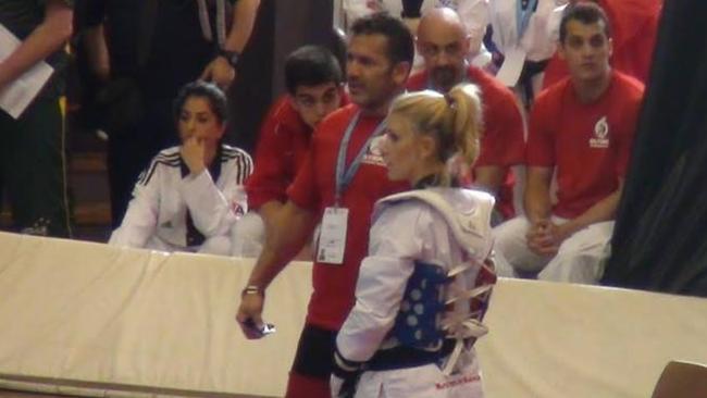 Cassie and her coach at the national championships in 2012.