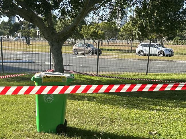 Following a dramatic caravan fire on the Gold Coast last week, an untouched rubbish bin has been spotted just metres from the scene, wanring of lithium. Picture: Ryan Keen