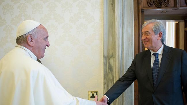 Pope Francis is greeted by Libero Milone in 2016. Picture: Reuters<lr/>