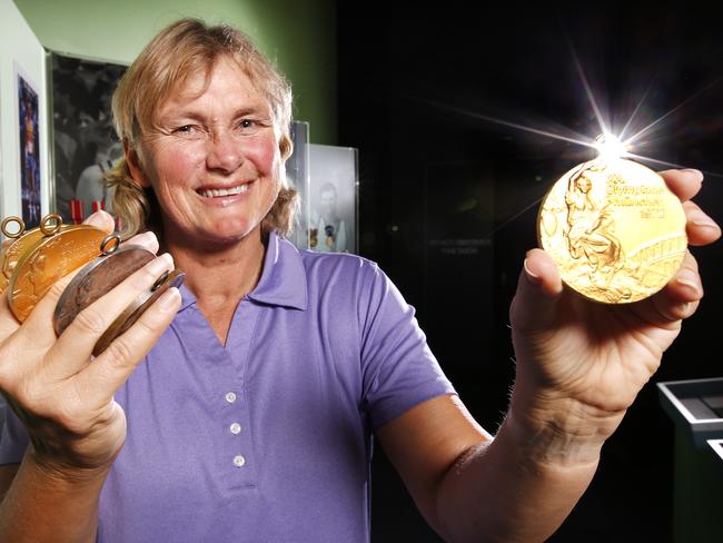 New exhibition at the National Sports Museum at the MCG showcases medals won by great Aussie athletes. Sneak preview of Gold for Australia!Swimming great Shane Gould with the five medals she won at the Munich Olympic Games in 1972.   Picture: David Caird.