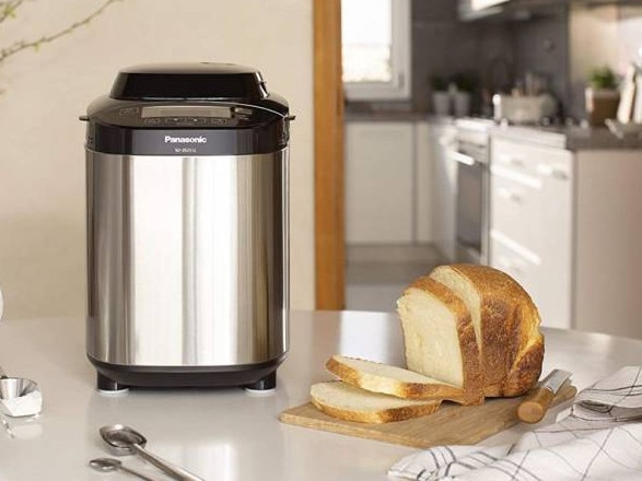 There's no "knead" to labour by hand for hours to create homemade loaves - these nifty bread makers can do all the hard work for you to create a perfect loaf every time. Image: Panasonic.
