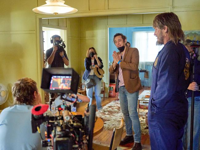 Big story, big names … Trent Dalton with Travis Fimmel (right) on the set of the Netflix adaptation of Boy Swallows Universe.