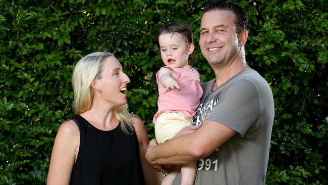 Michael Zirps with his wife Tameeka and baby Ella at their Illawong home. Picture: Jonathan Ng