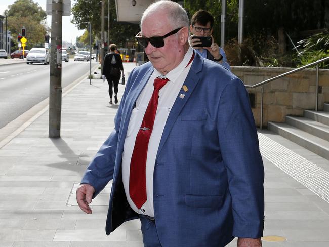 The father of former NSW police minister Troy Grant, Kenneth Wayne Grant leaves Newcastle Local Court in Newcastle, Wednesday, February 26, 2020. (AAP Image/Darren Pateman)