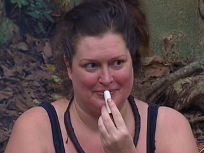 Tziporah Malkah signals to a friend back home in Australia by applying lip balm. Picture: Channel 10