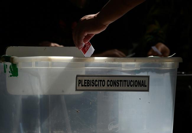 A man casts his vote during a referendum on a new constitution in Chile on December 17, 2023