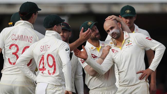 Australia's Nathan Lyon celebrates with teammates after taking the wicket of England's Stuart Broad at Lord’s. Picture: AP