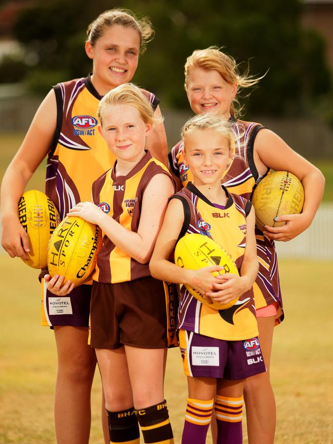 Proud Hawks players Kirilee Stanmore, 12, Scarlett Jackson, 10, Marley Kozak, 10, and Tahnee Sparks, 12.