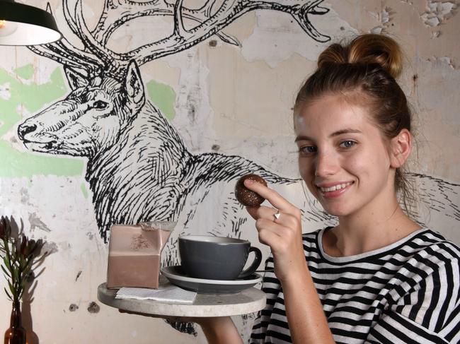 Gemma Gillin from Elk Espresso Broadbeach with the signature hot chocolate sphere. Photo: Steve Holland