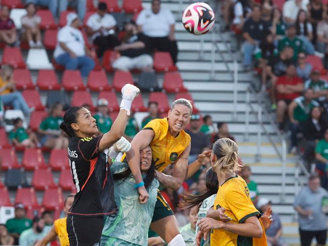 Alanna Kennedy puts pressure on the Mexican goal. Picture: Getty