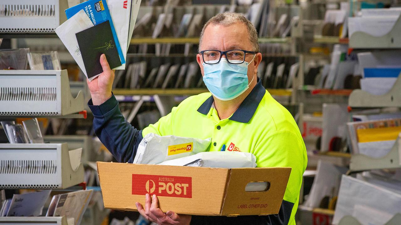 Postie David Burns during the COVID-19 lockdown when volumes skyrocketed even as AusPost executives were planning to cut back on workers.