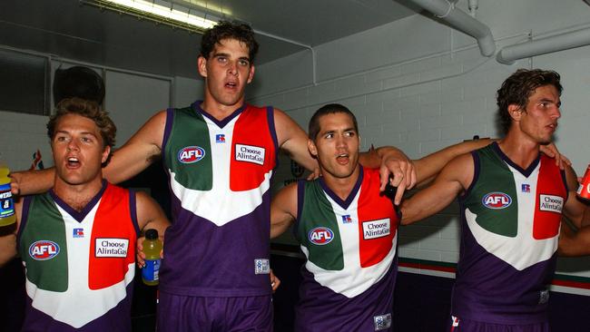 The 2003 Dockers sing their song with about as much enthusiasm as other fans have for the ‘tune’.