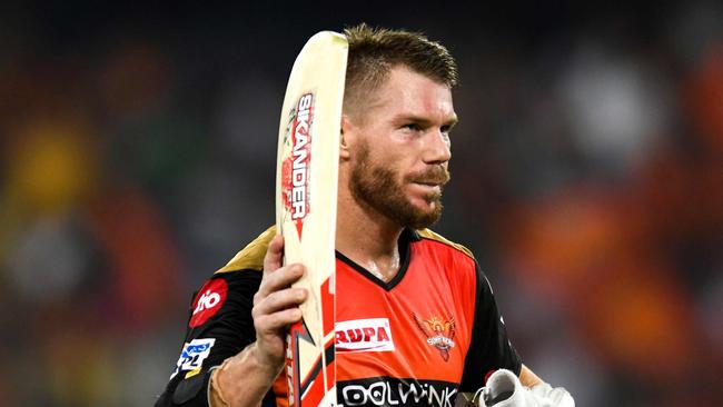 Sunrisers Hyderabad cricketer David Warner walks back to the pavilion during the 2019 Indian Premier League (IPL) Twenty20 cricket match between Sunrisers Hyderabad and Kings XI Punjab at the Rajiv Gandhi International Cricket Stadium in Hyderabad on April 29, 2019. (Photo by NOAH SEELAM / AFP) / ----IMAGE RESTRICTED TO EDITORIAL USE - STRICTLY NO COMMERCIAL USE-----