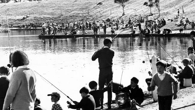 Schoolchildren participate in a fishing contest at Edwardes Lake, Reservoir in 1969.