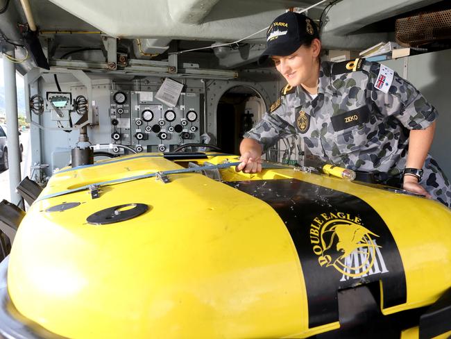 Sub Lieutenant Ivanka Zeko and the Mine Disposal Vehicle on HMAS Yarra, which did the  last search for HMAS AE1. Picture: Calum Robertson