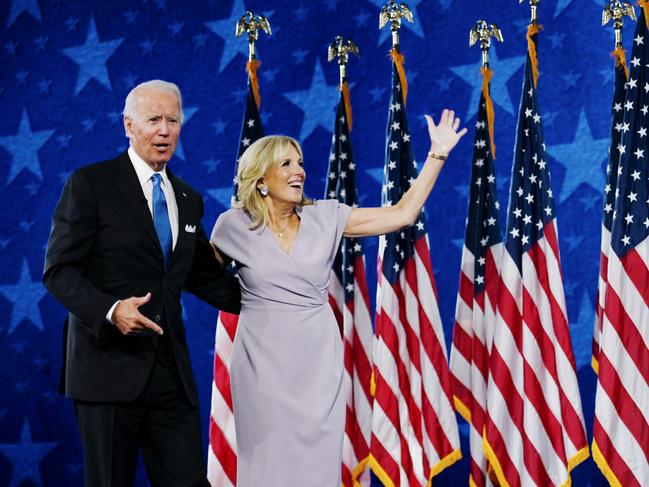 FILE FASHION -  FILE FASHION -  Jill Biden and husband former vice-president and Democratic presidential nominee Joe Biden stand on stage at the Chase Center in Wilmington, Delaware, at the conclusion of the Democratic National Convention, held virtually amid the novel coronavirus pandemic, on August 20, 2020. (Photo by Olivier DOULIERY / AFP)