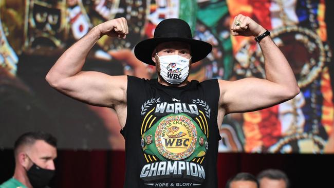 Tyson Fury weighs in before his fight against Deontay Wilder. Picture: Robyn Beck/AFP