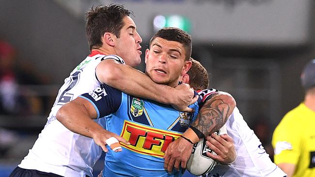 Ashley Taylor of the Titans takes the ball up during the Round 18 NRL match between the Gold Coast Titans and the Sydney Roosters at Cbus Super Stadium on the Gold Coast, Sunday, July 15, 2018. (AAP Image/Dave Hunt) NO ARCHIVING, EDITORIAL USE ONLY