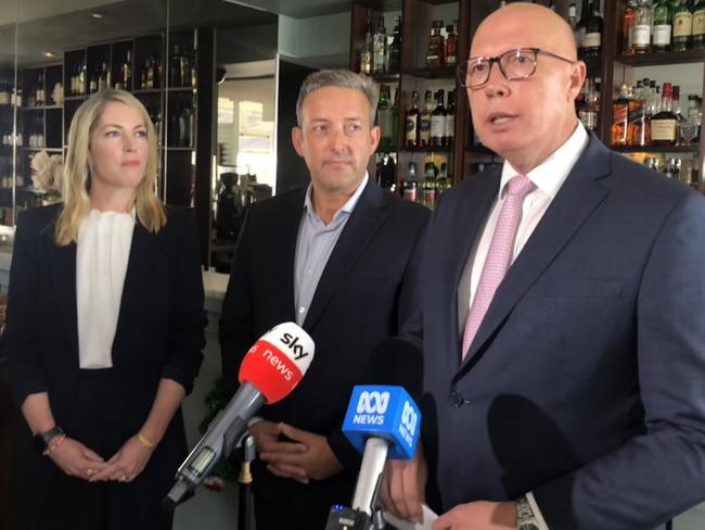 Federal Opposition leader Peter Dutton (right) with local Liberal candidates Jaimee Rogers and James Brown in Dee Why on Wednesday. Picture: Jim O’Rourke