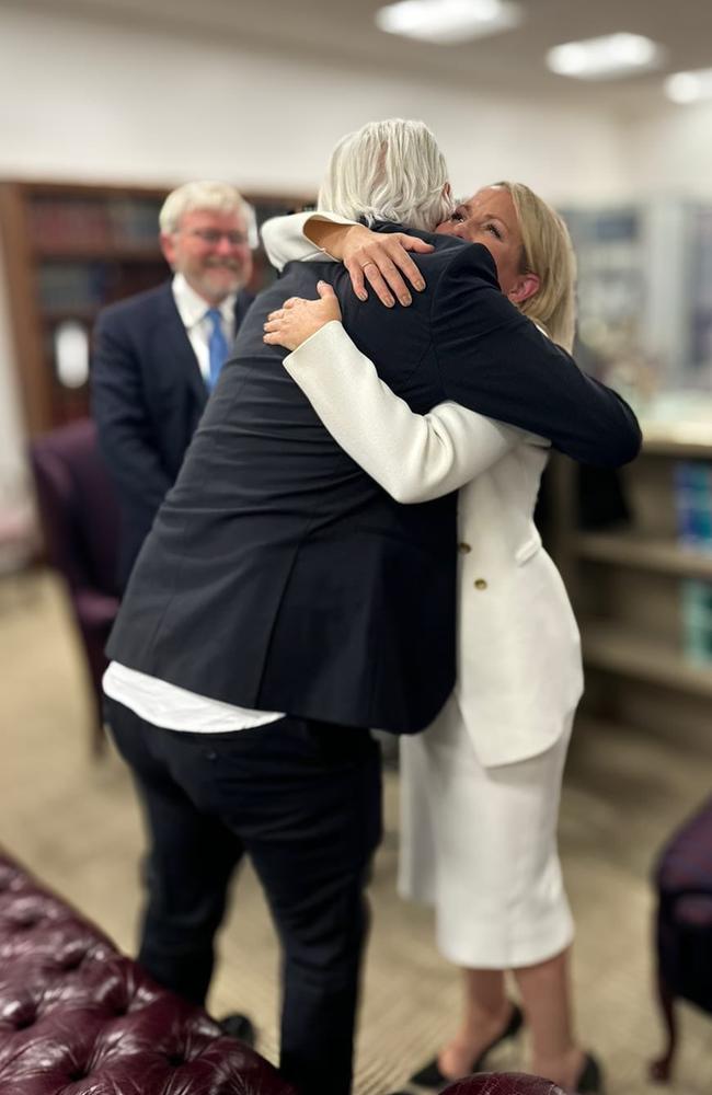 Julian Assange and his lawyer Jennifer Robinson embrace after he was set free, with Kevin Rudd smiling in the background. Picture: Instagram