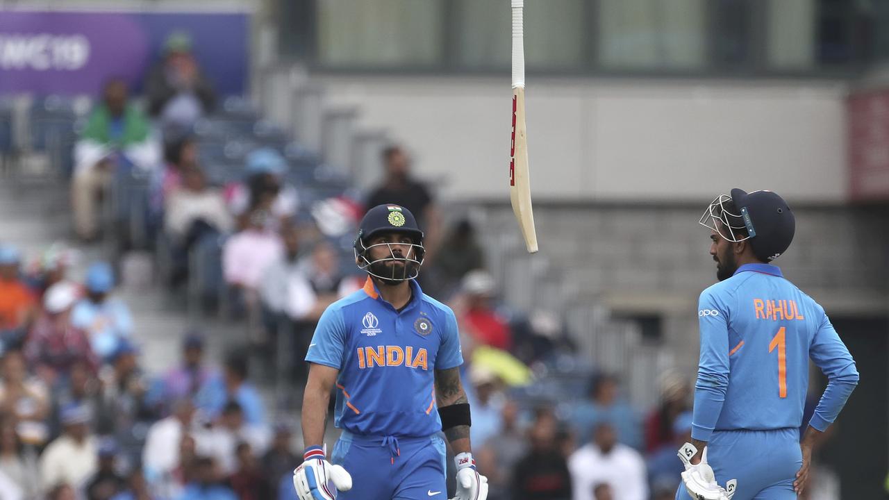 India's captain Virat Kohli, flopped, then flipped his bat. (AP Photo/Aijaz Rahi)