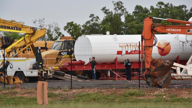 Police investigate the scene of a fatal workplace accident at Tivendale on Monday evening. PICTURE Will Zwar