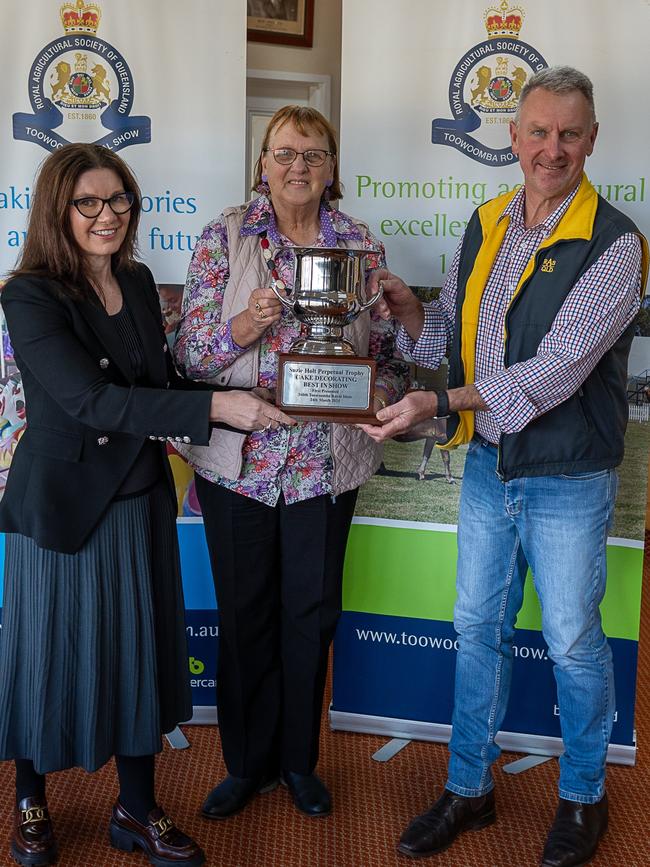 Holding the new Suzie Holt Perpetual Trophy is (from left) donor Suzie Holt, chief cookery steward May Gossow and RASQ chief executive Damon Phillips.