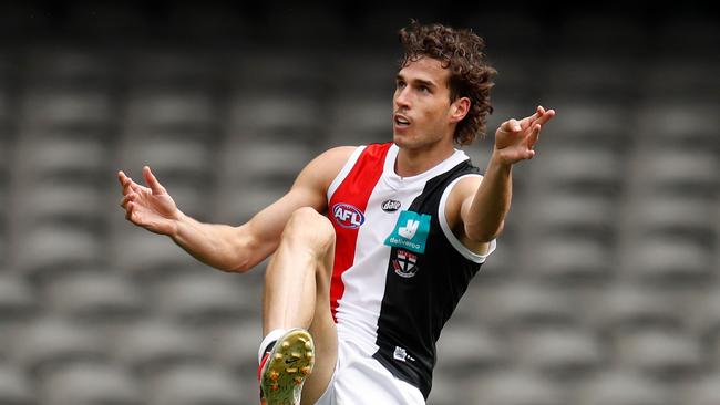 Max King launches a shot for goal during his first AFL appearance for St Kilda.