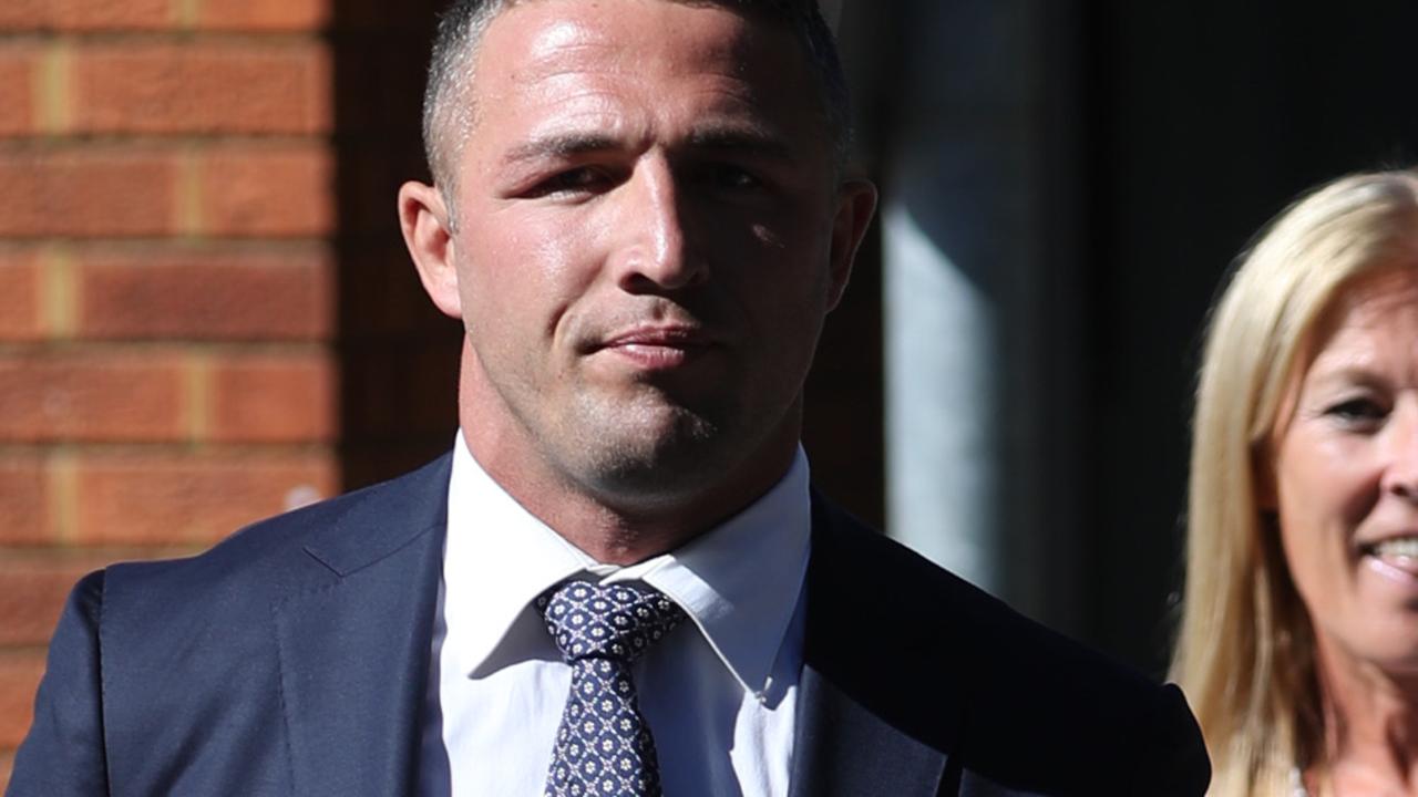 Sam Burgess arrives at Moss Vale court with his legal team which includes Brian Wrench. picture John Grainger