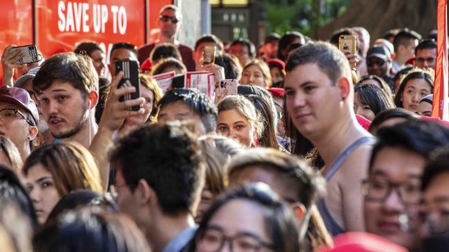 Hordes of people line up outside of The David Jones City Store during Boxing Day sales in Sydney today. Pic Jenny Evans