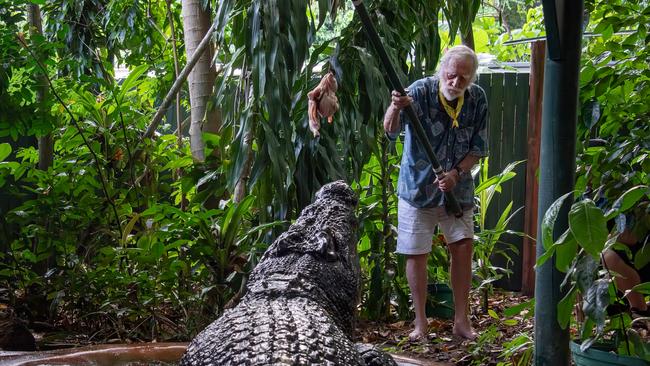 George Craig and Cassius the crocodile on Green Island. Picture: Brian Cassey