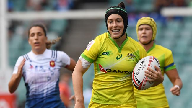 Emilee Cherry makes a run for it against France. Picture: AAP