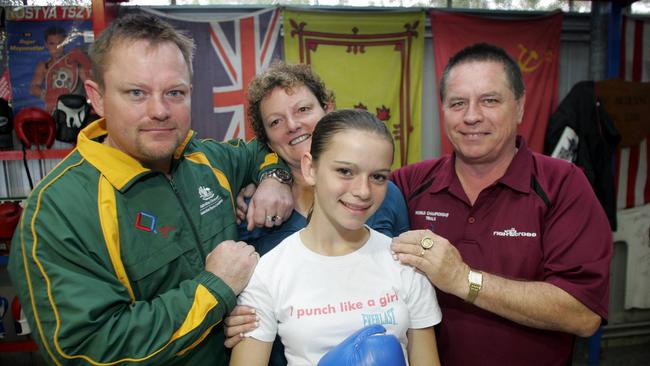 Skye Nicolson as a child ahead of a fight, with trainer and brother Allan (left), mother Pat and father Allan.