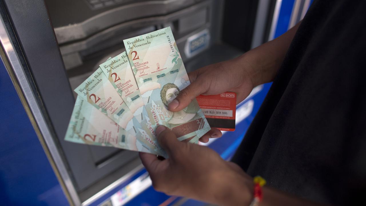 Venezuela’s new currency has five fewer zeros and is part of measures to tame soaring inflation. Picture: AP/Ariana Cubillos