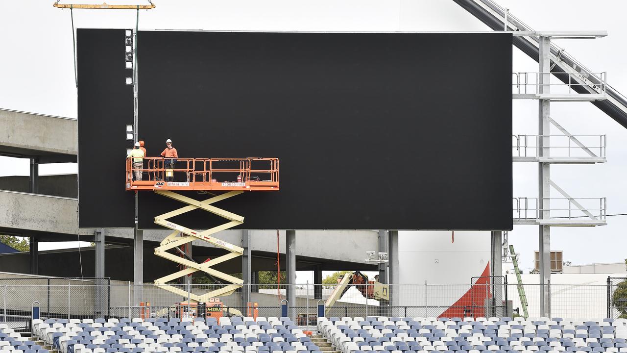 A new scoreboard at the southern end of GMHBA Stadium is being installed currently. Picture: Alan Barber.