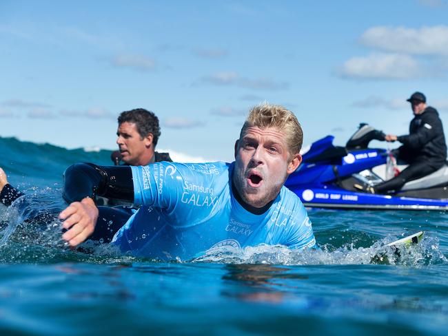 Mick Fanning celebrates after winning his the final at Bells Beach, Victoria. Mick has now rung the Bell four times Picture © WSL/ Cestari
